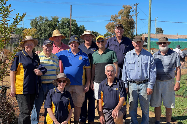 Volunteers assisting with planting of new gardens